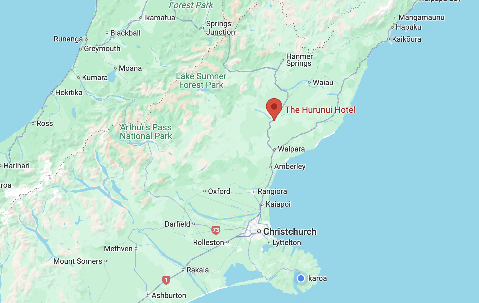 Aerial view of {BUSINESS_INFO.name} showing {LOCATION.address.highway} frontage and rural {LOCATION.address.region} setting